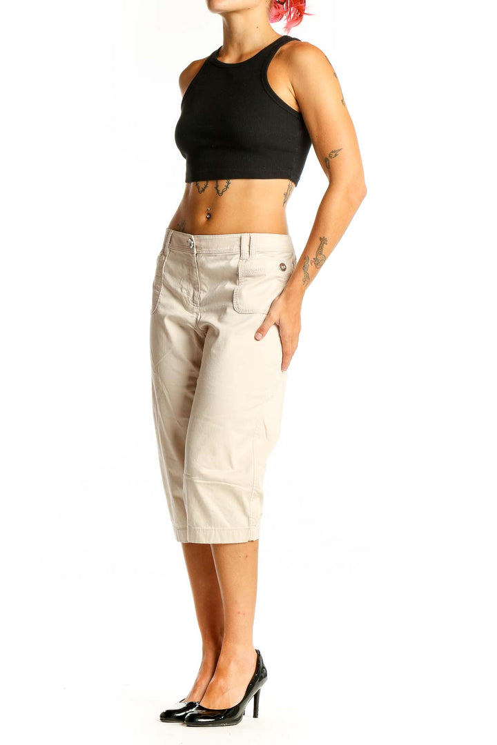 Front view of White House Black Market beige capri pants