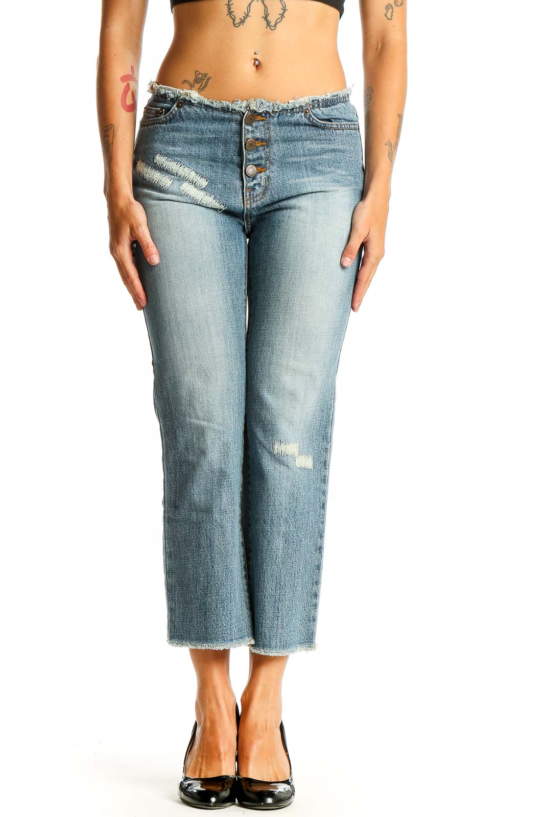 Front view of California Dream light blue distressed cropped jeans with button-fly