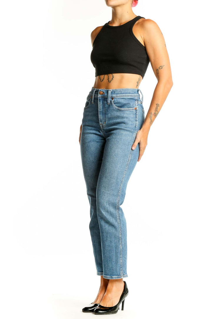 Front view of Madewell light blue high-waisted straight leg jeans