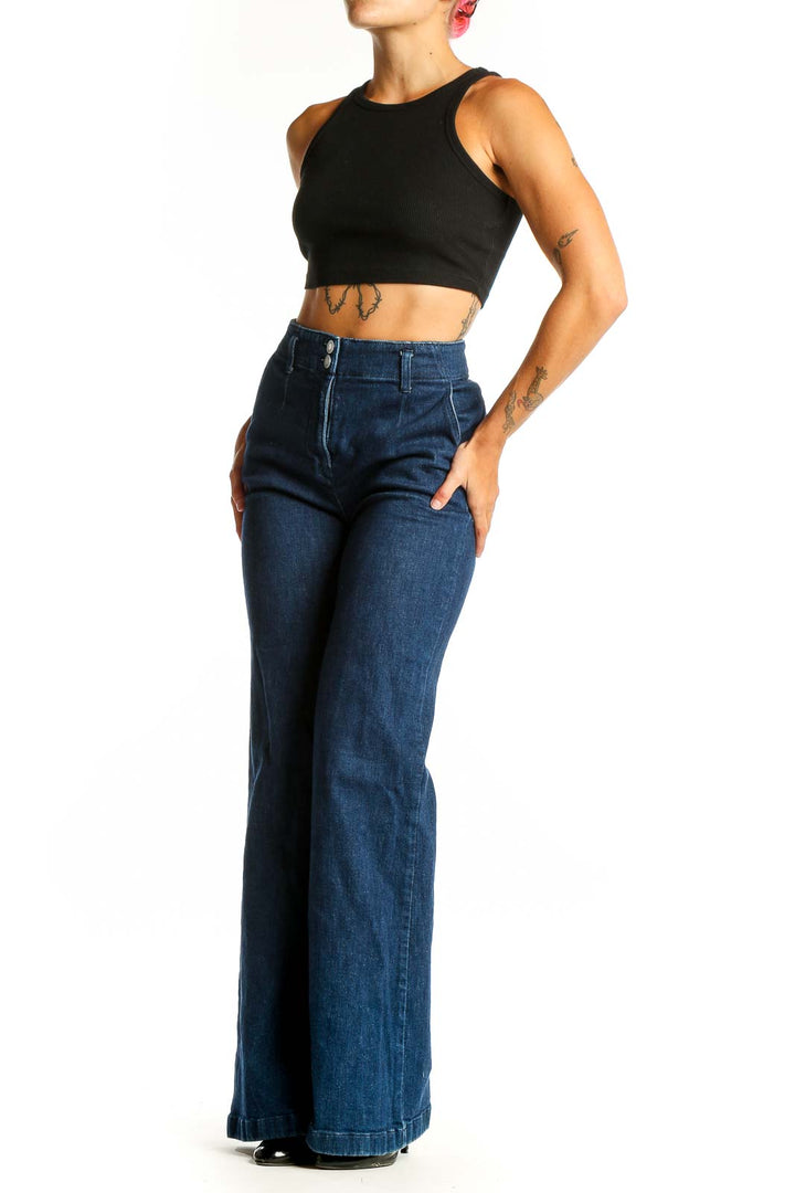 Front view of Maeve dark blue high-waisted wide-leg jeans on model