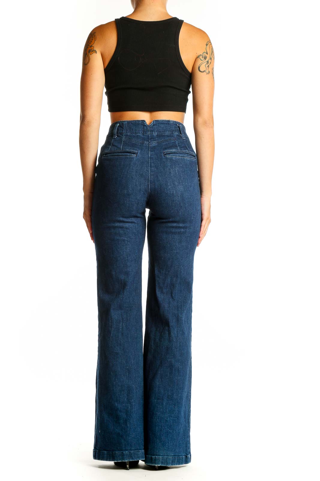 Side view of Maeve dark blue high-waisted wide-leg jeans on model