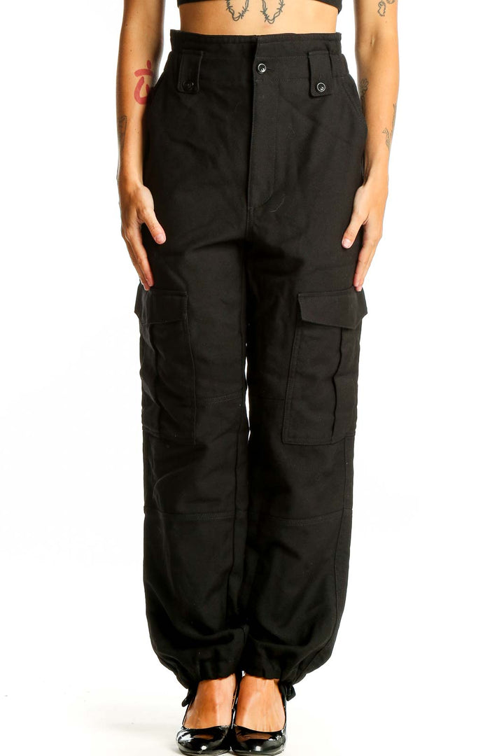 Front view of Banana Republic black wool cargo pants with multiple pockets