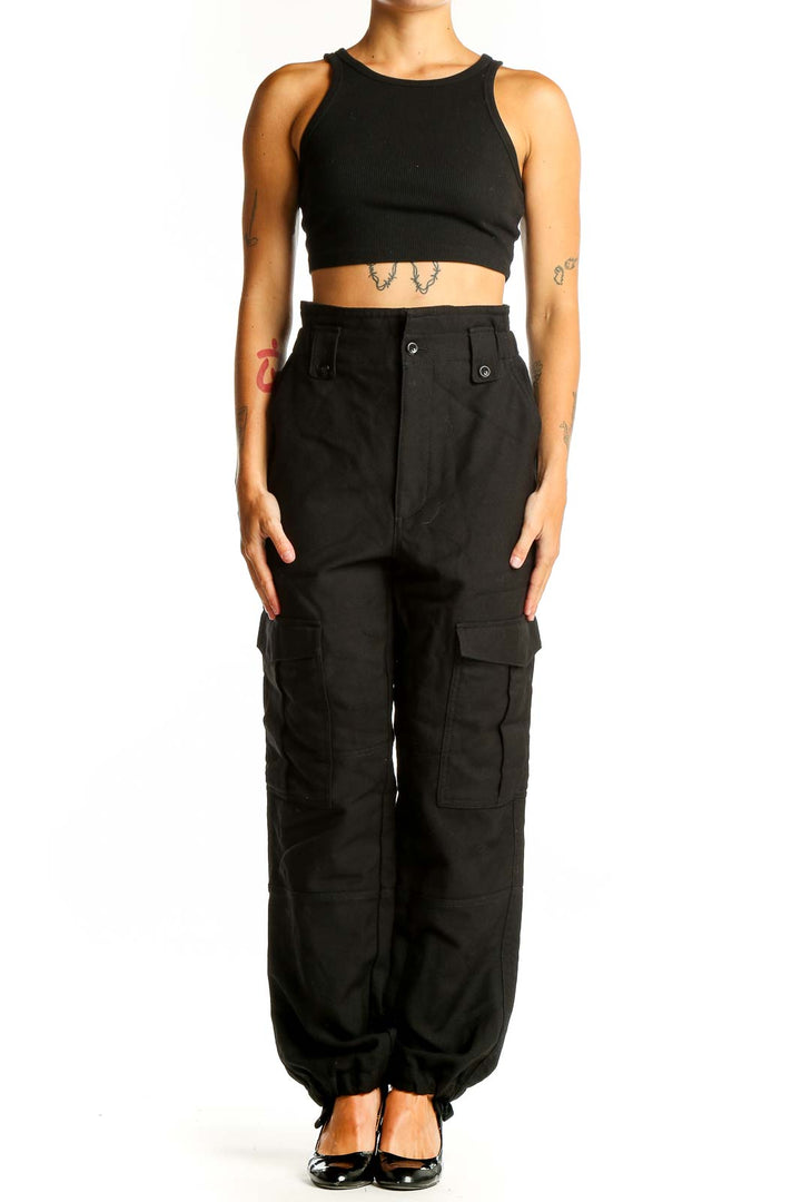 Front view of Banana Republic black wool cargo pants with multiple pockets