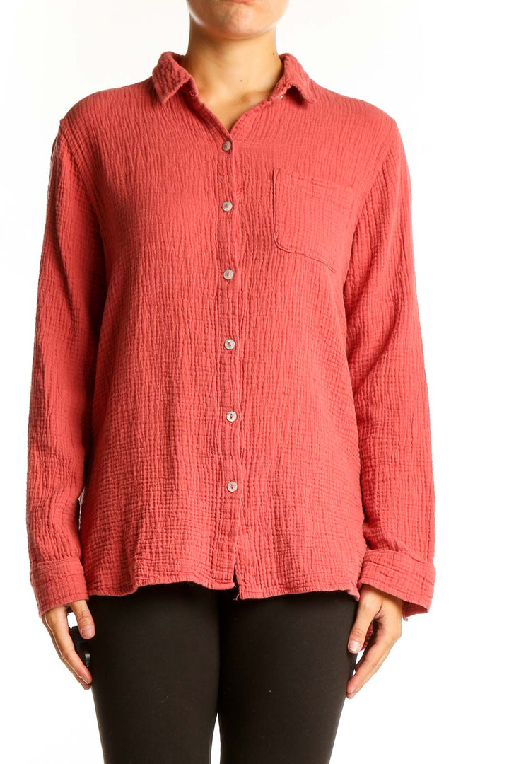 Front view of Jessica Simpson coral textured button-down shirt