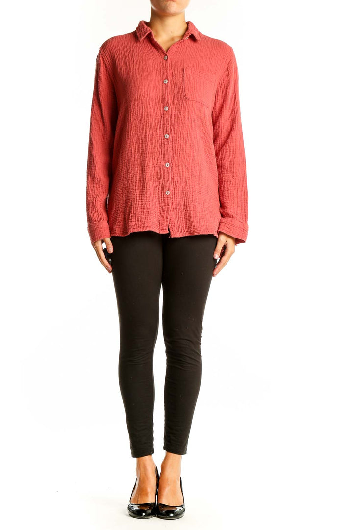 Front view of Jessica Simpson coral textured button-down shirt