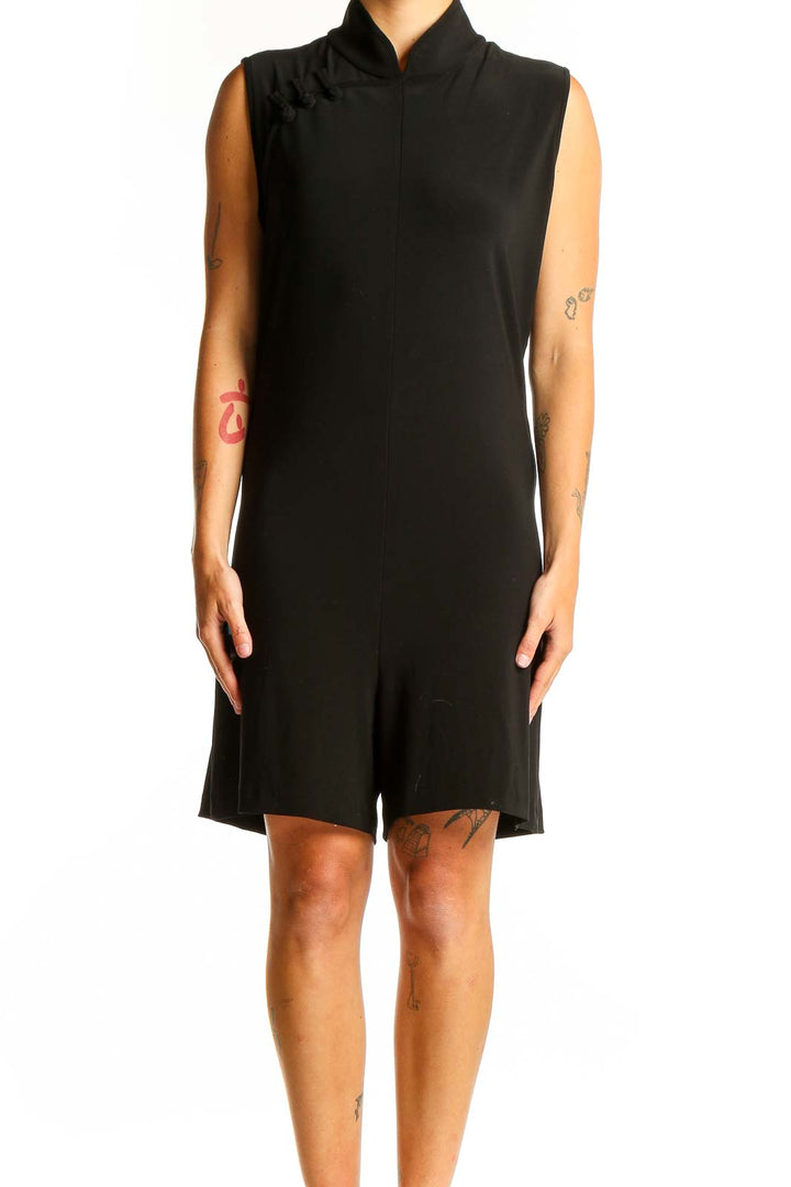 Front view of NORMA KAMALI black sleeveless jumpsuit with high neckline