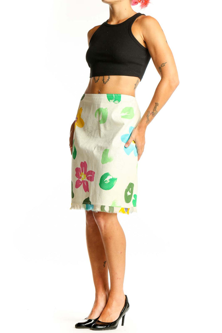 Front view of cream SilkRoll pencil skirt with colorful floral print