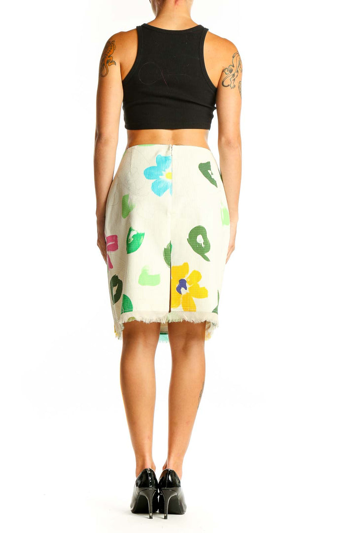 Side view of model wearing cream SilkRoll floral print pencil skirt with black top