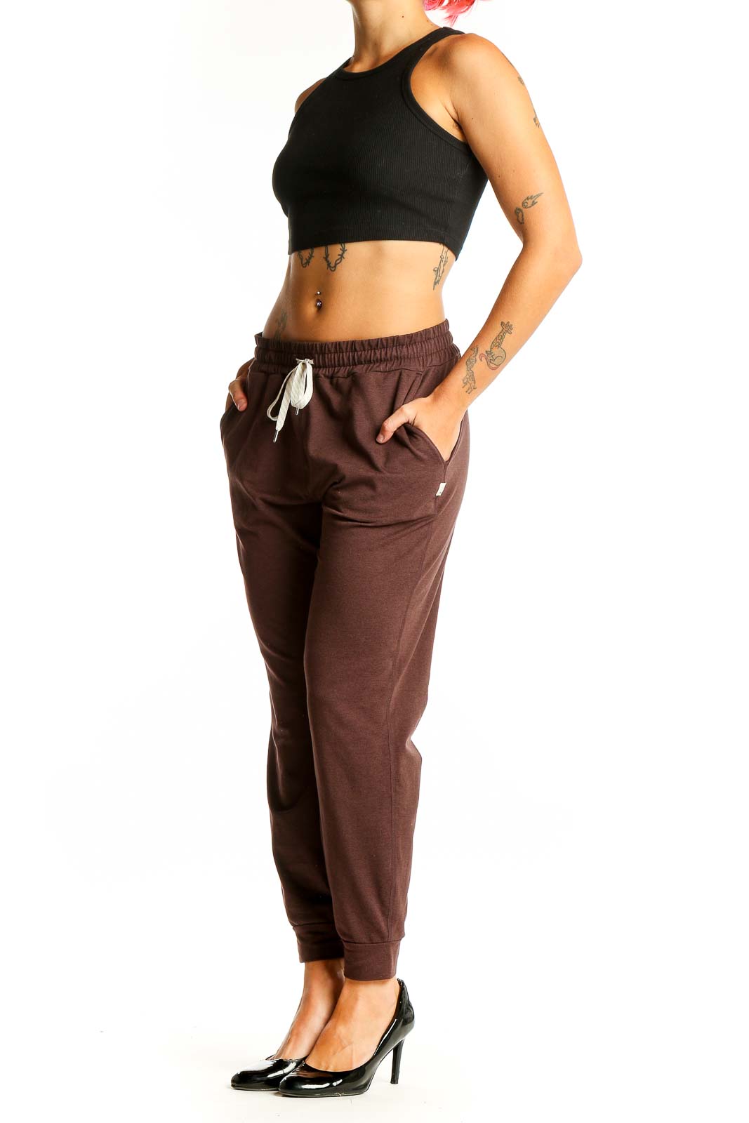 Front view of brown Vuori jogger pants with drawstring waist