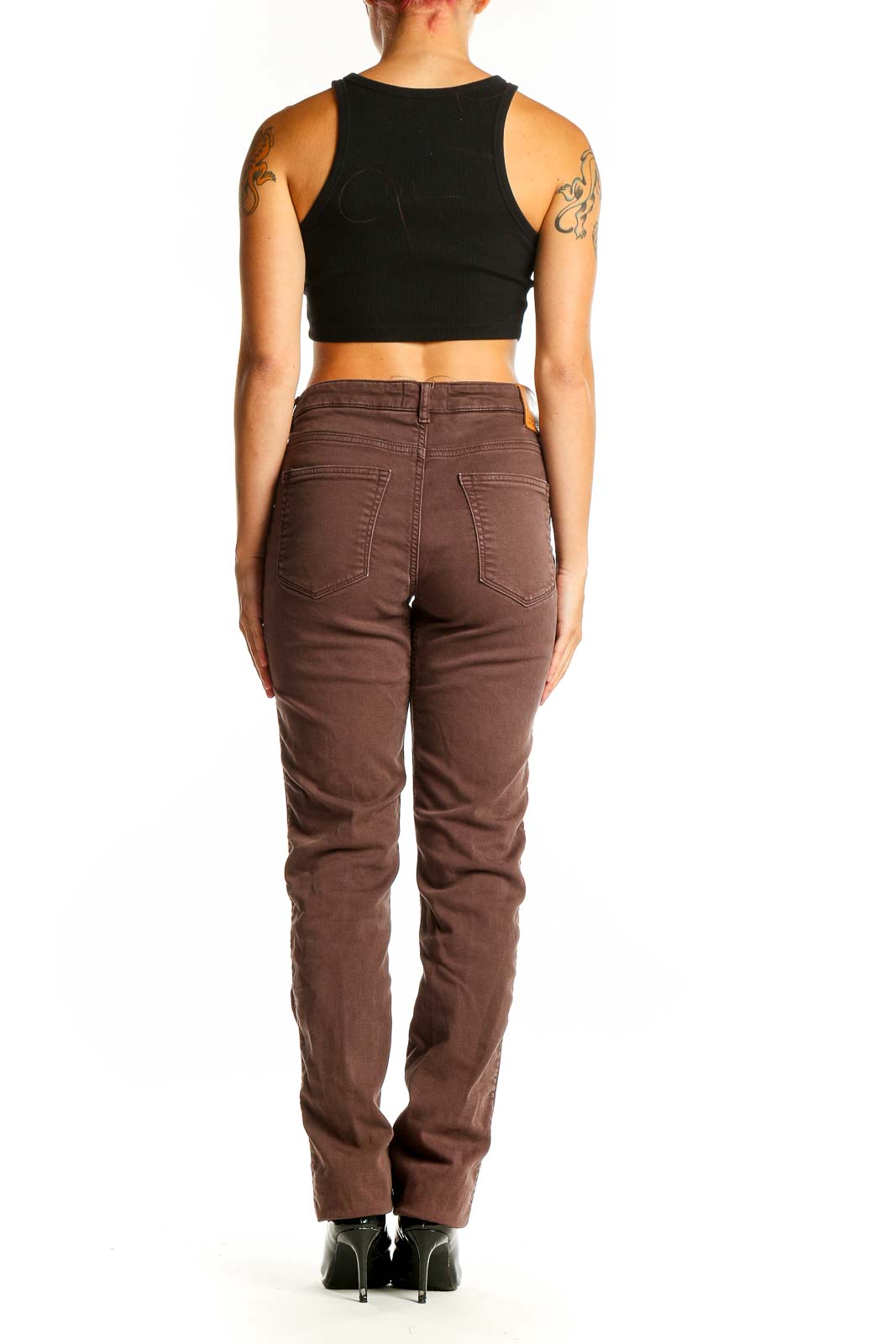 Side view of DU/ER brown straight leg jeans on model