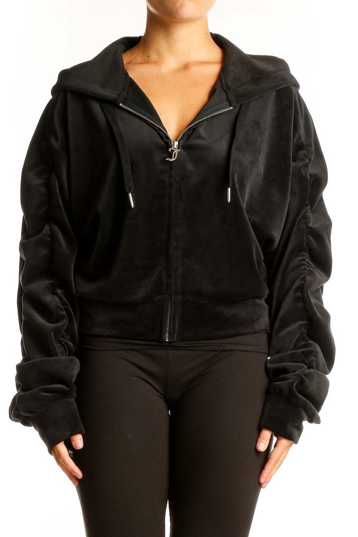 Front view of Juicy Couture black velour zip-up hoodie jacket