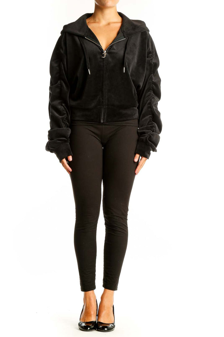 Front view of Juicy Couture black velour zip-up hoodie jacket