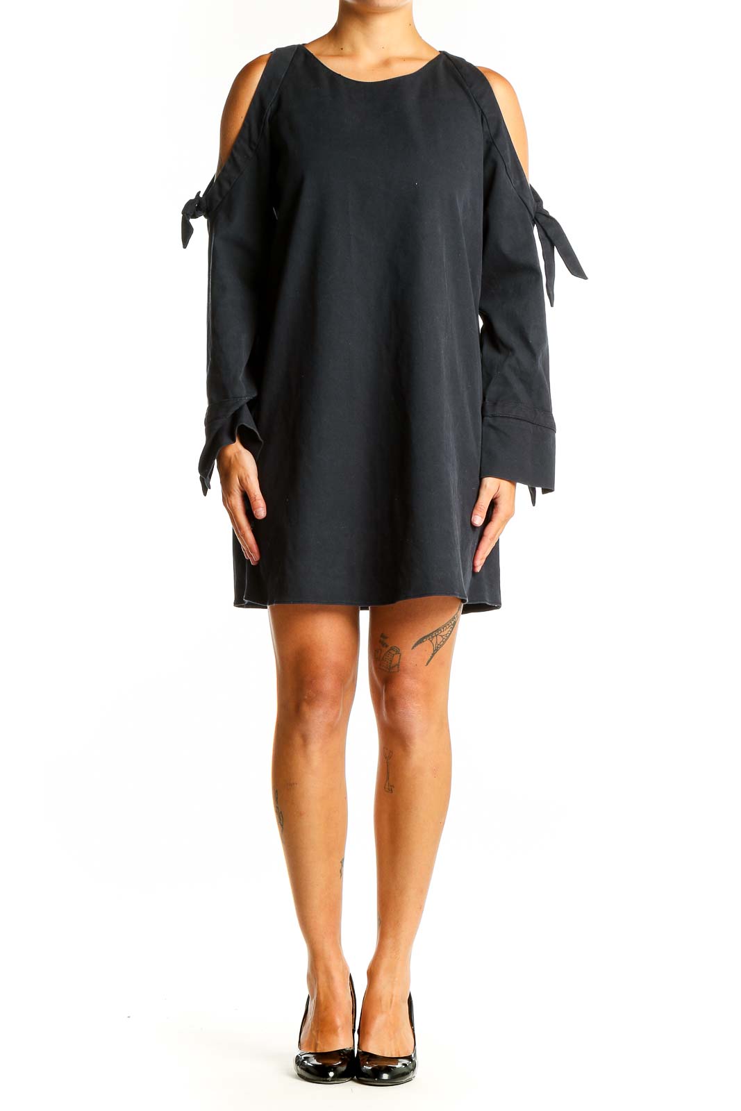Front view of black Zara Trafaluc mini dress with cold shoulders and tie-sleeves