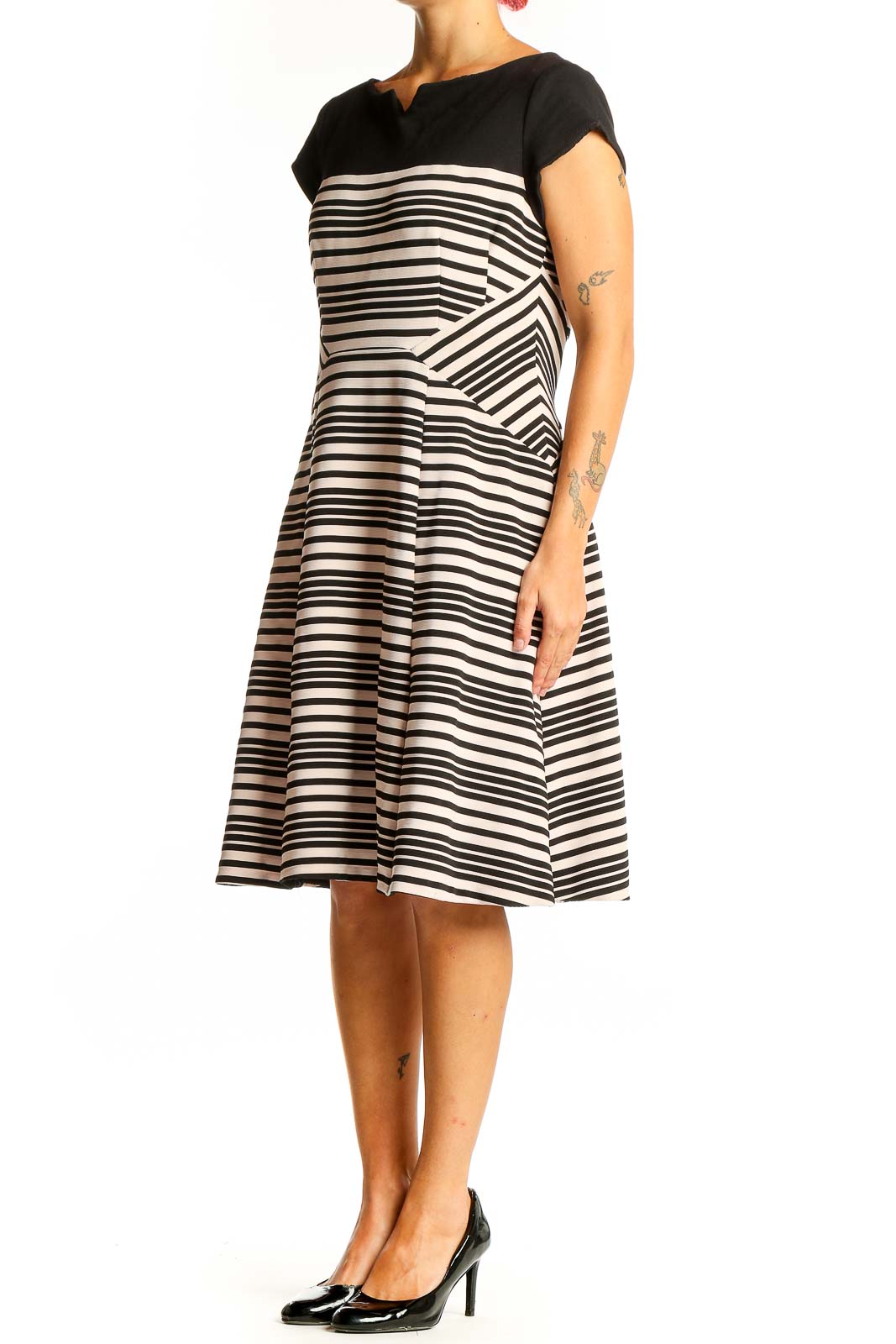 Front view of Nanette Lepore black and white striped fit-and-flare dress with boat neckline