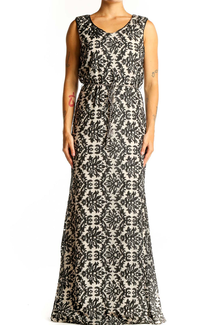 Front view of Chelsea & Violet Black and Beige Floral Maxi Dress