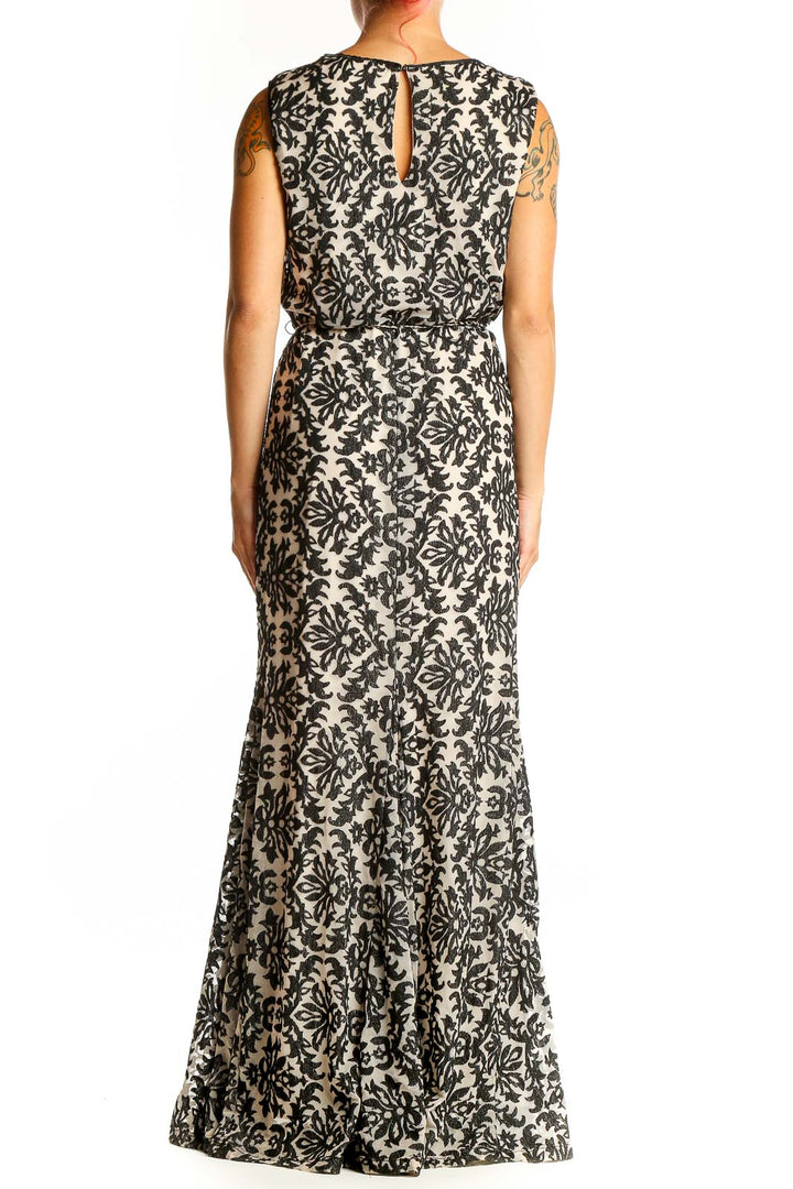 Side view of Chelsea & Violet Black and Beige Floral Maxi Dress