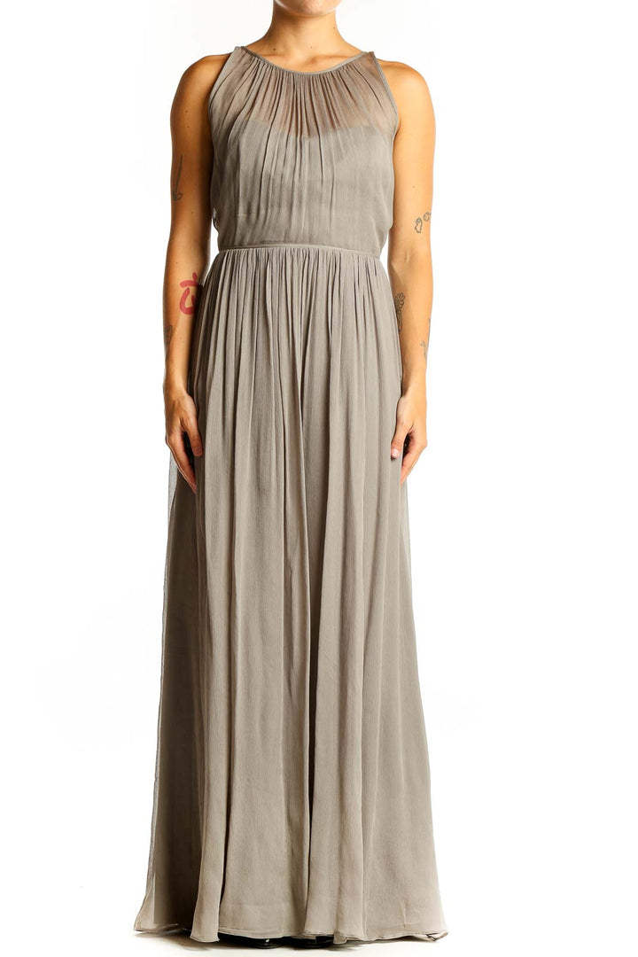 Front view of taupe J.Crew pleated chiffon maxi dress with gathered neckline