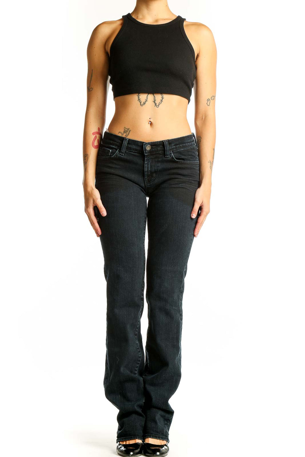Front view of J Brand dark blue slim fit bootcut jeans on model