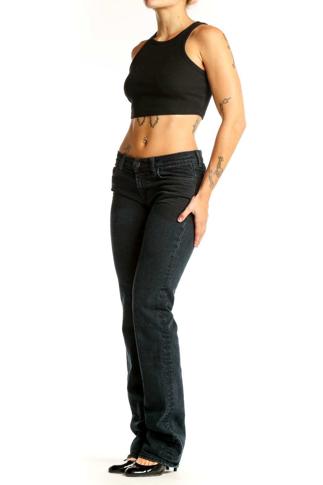 Front view of J Brand dark blue slim fit bootcut jeans on model