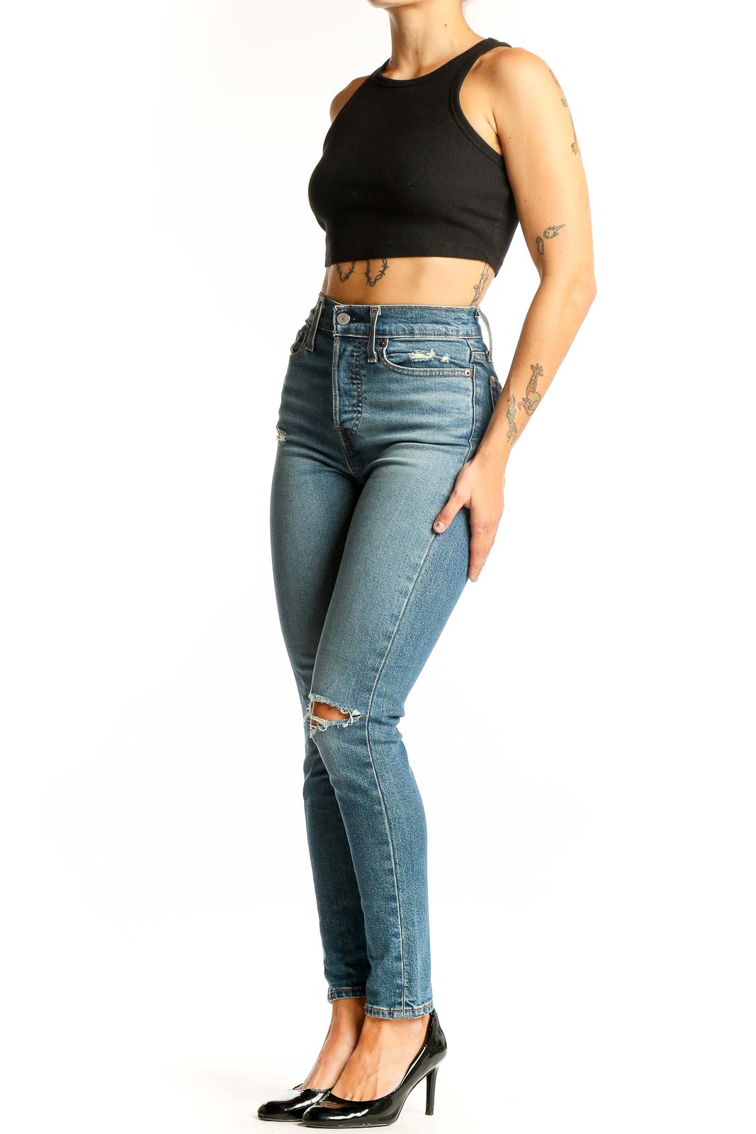 Front view of Levi's light blue high-waist skinny jeans with distressing