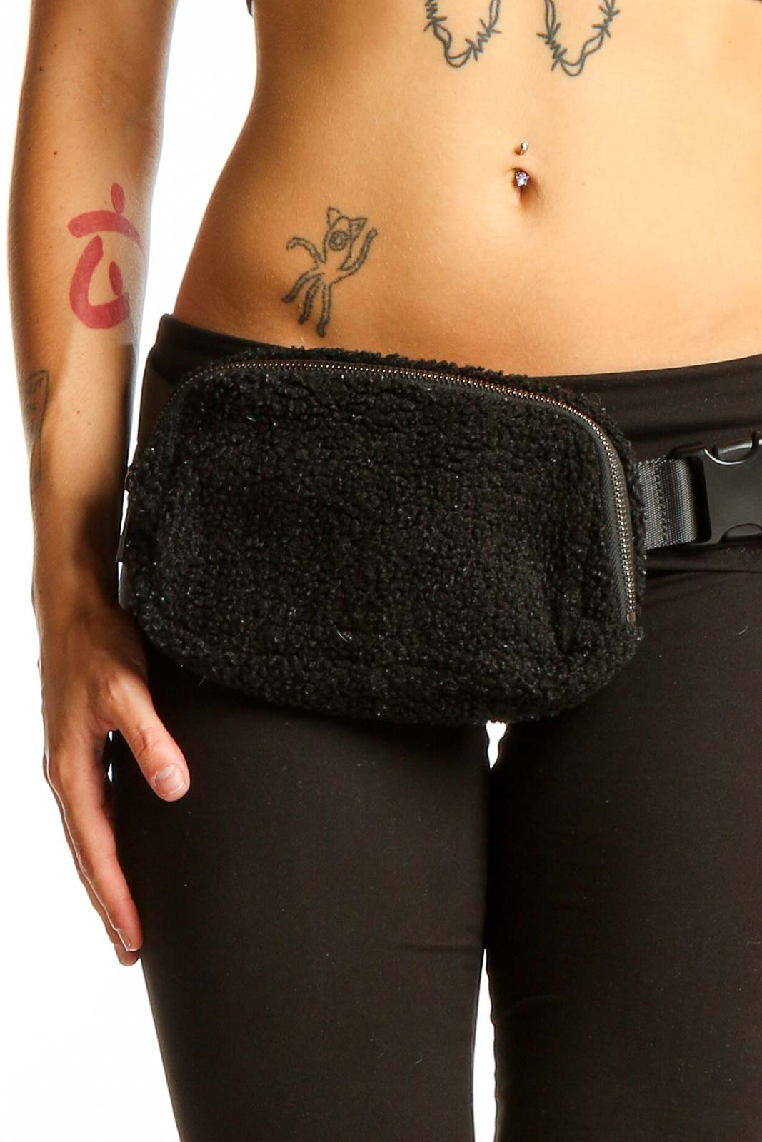 Front view of black fuzzy fanny pack with adjustable strap