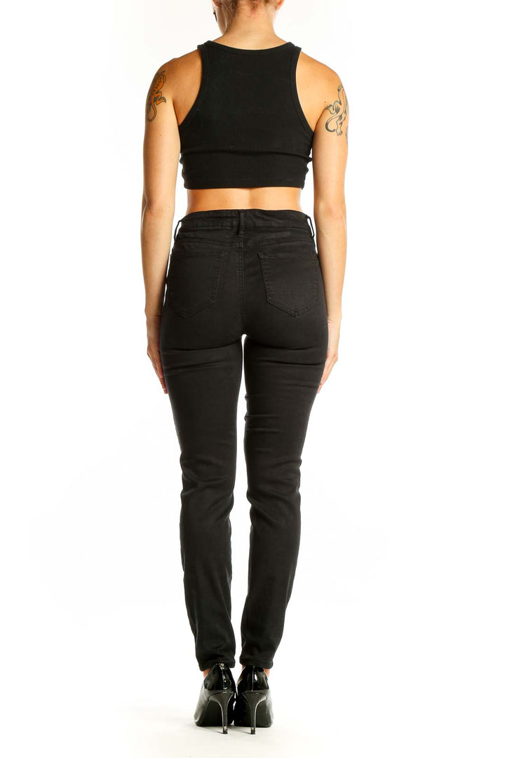 Side view of Buffalo by David Bitton black slim-fit jeans on model