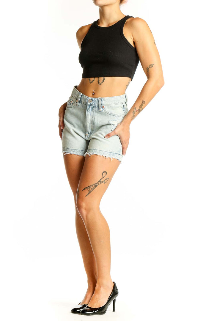 Front view of Gap light blue distressed denim shorts with high-rise waist