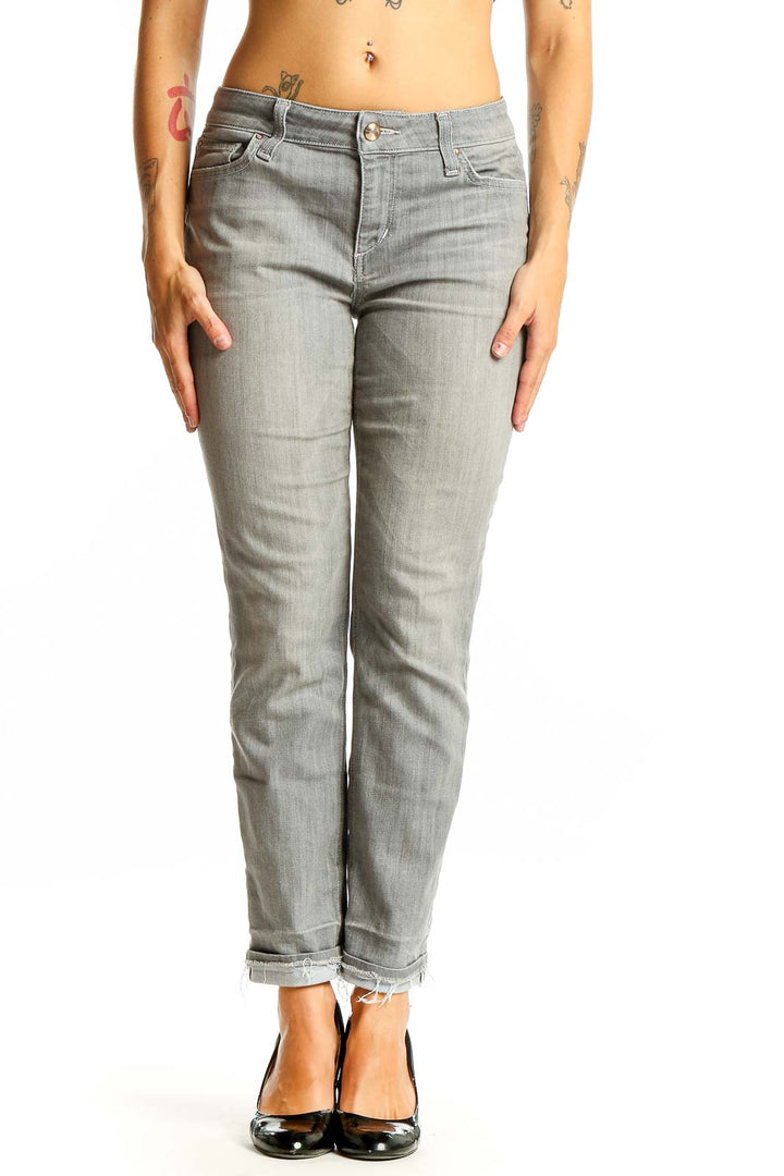 Front view of Joe's gray slim fit ankle-length jeans on model