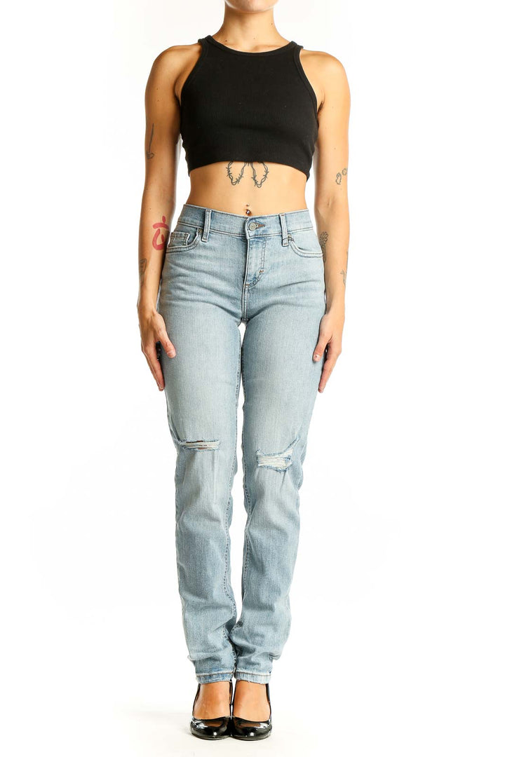 Front view of Banana Republic light blue distressed straight leg jeans on model