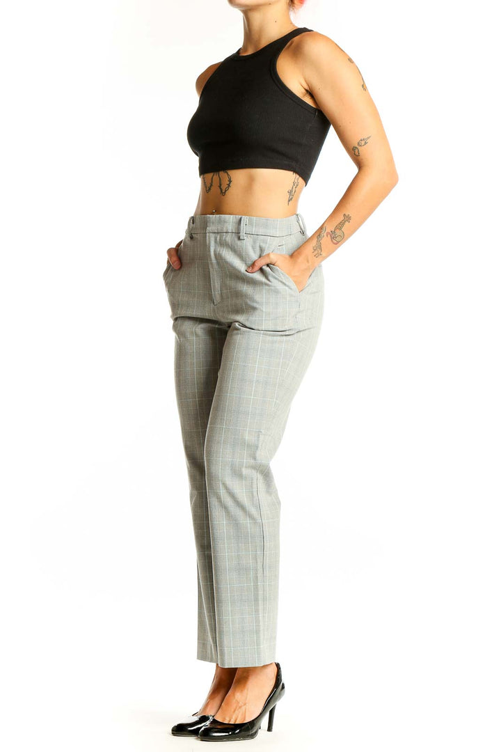 Front view of Uniqlo gray plaid suit pants on model