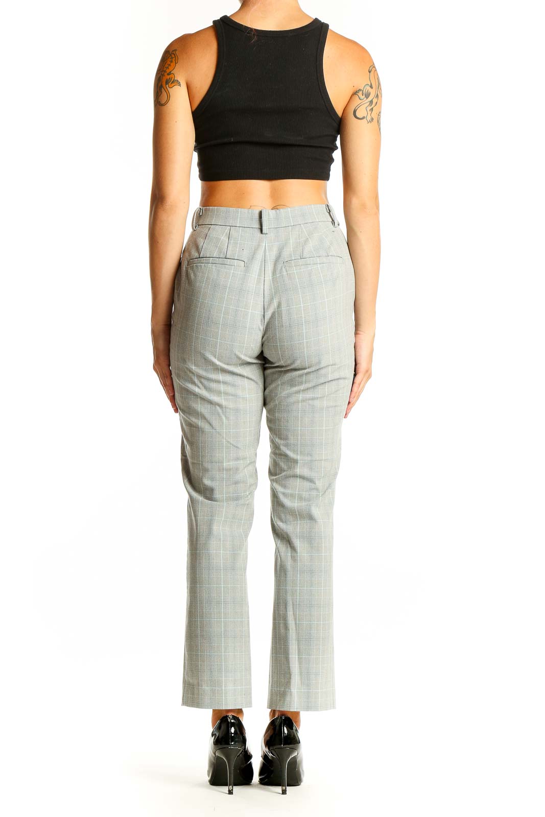 Side view of Uniqlo gray plaid suit pants with black top