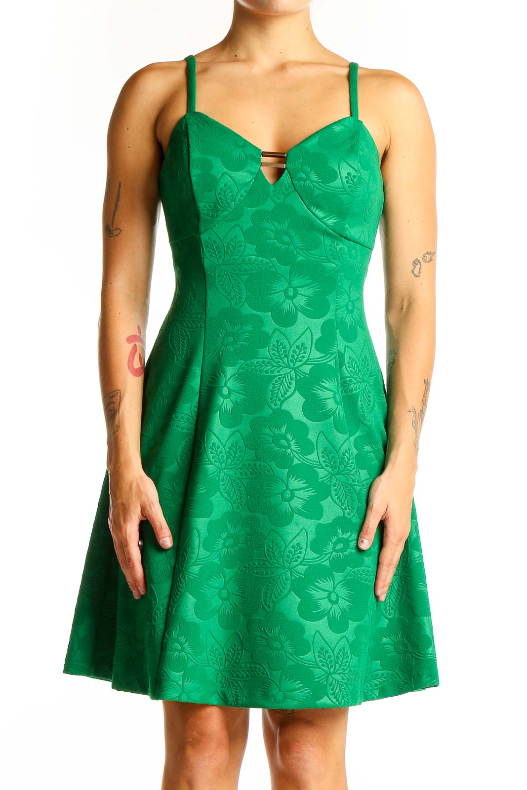 Front view of green Guess dress with embossed floral pattern and sweetheart neckline