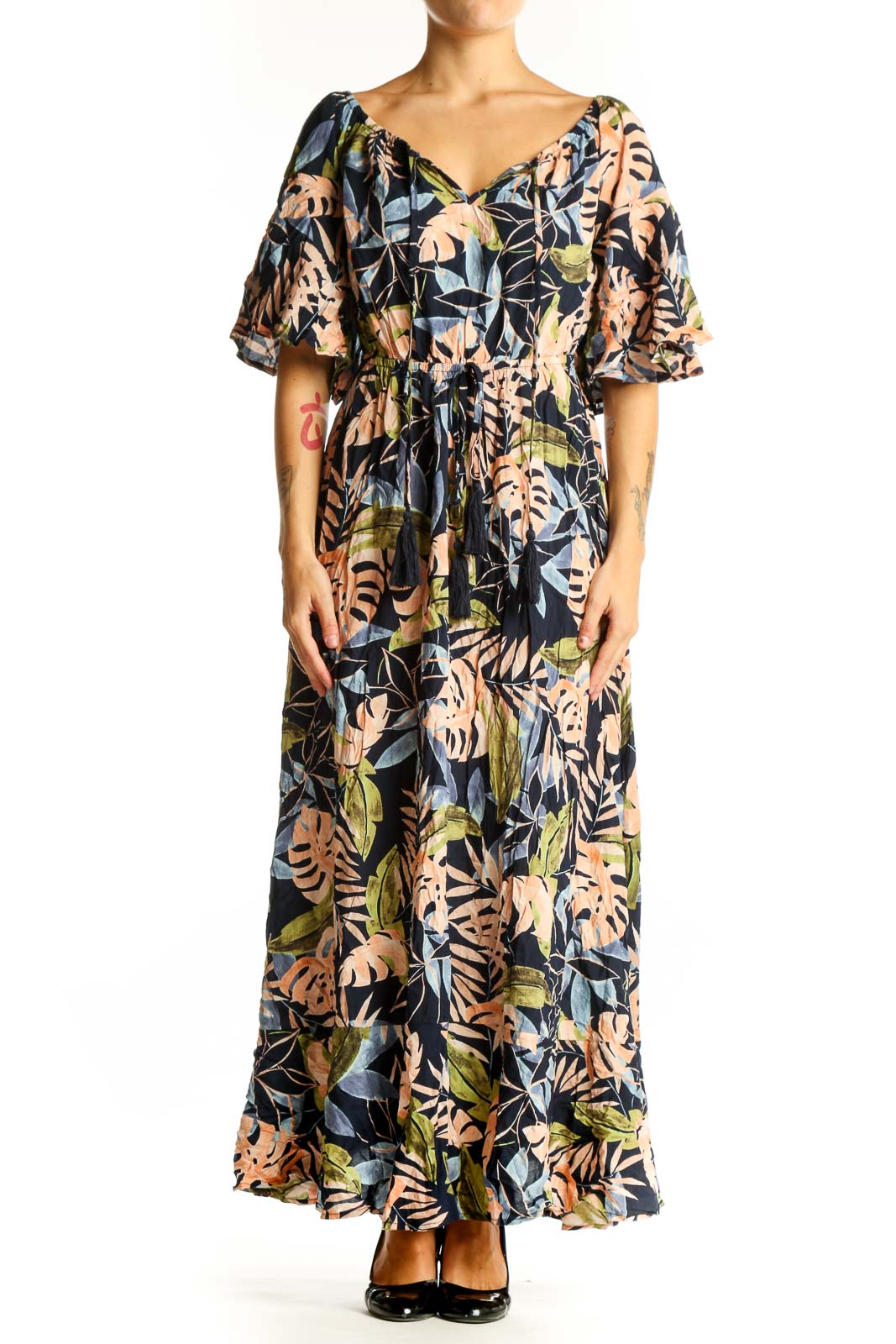 Front view of multicolor tropical print maxi dress with flutter sleeves