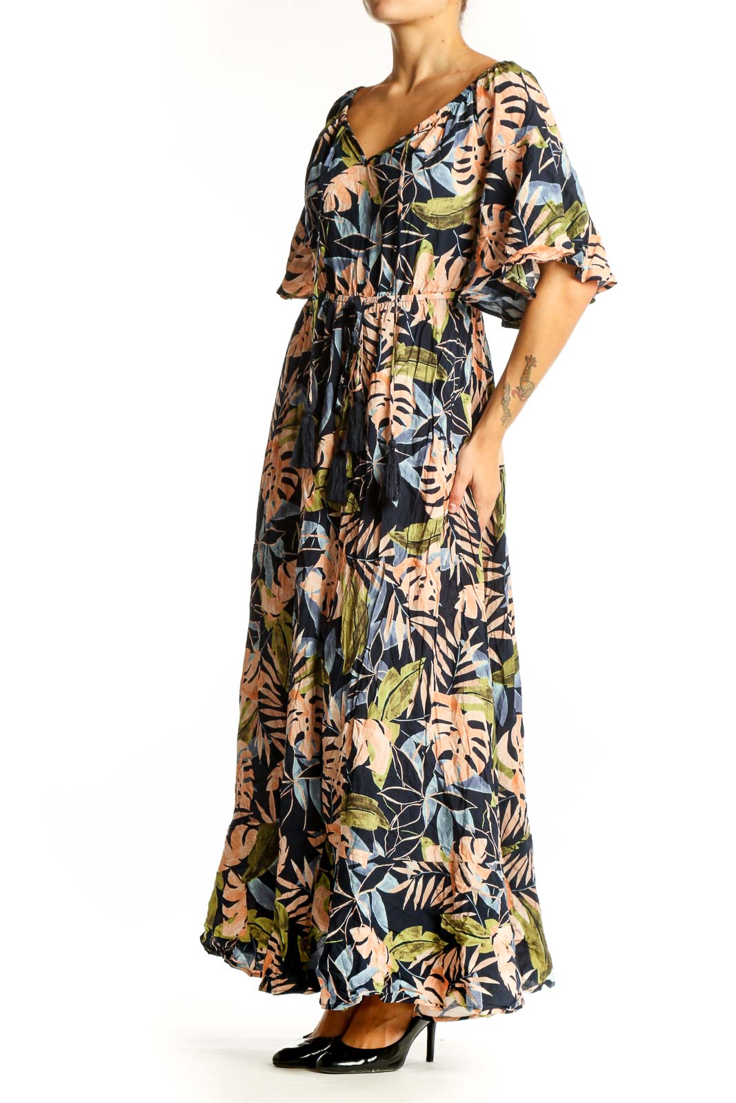 Front view of multicolor tropical print maxi dress with flutter sleeves