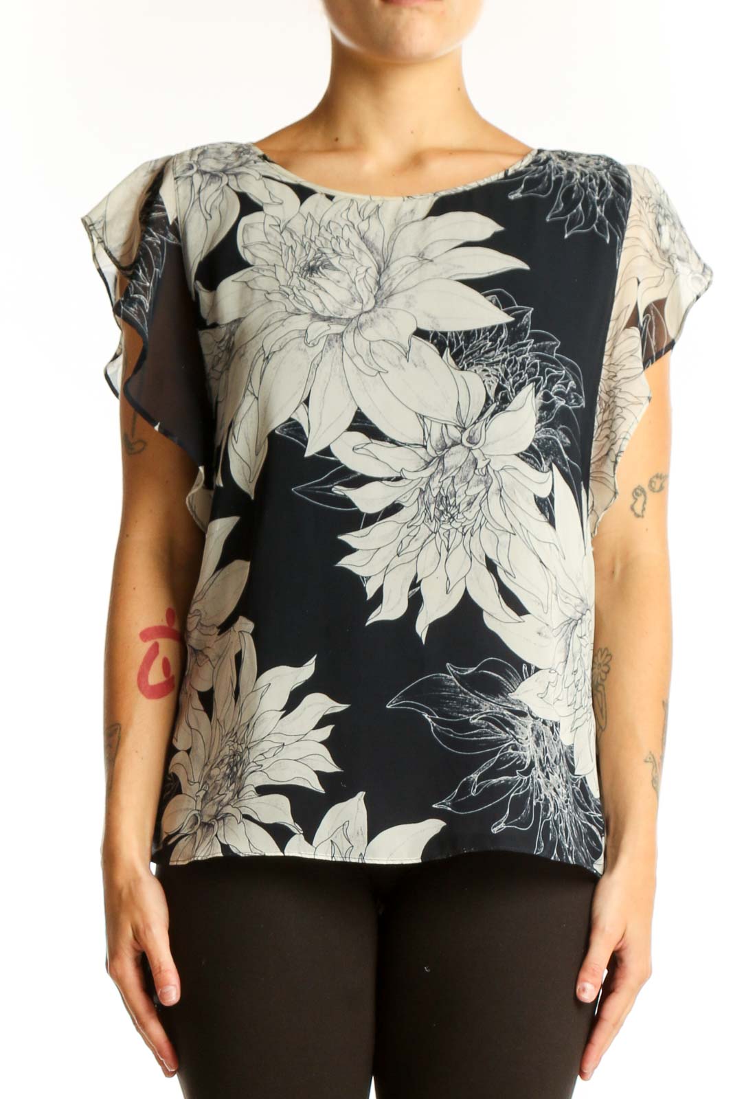 Front view of Vince Camuto black and white floral print blouse with flutter sleeves