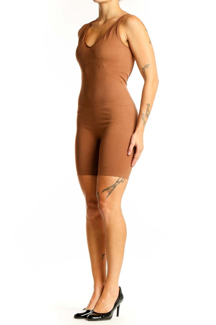 Front view of Pink Active brown bodycon jumpsuit with V-neck