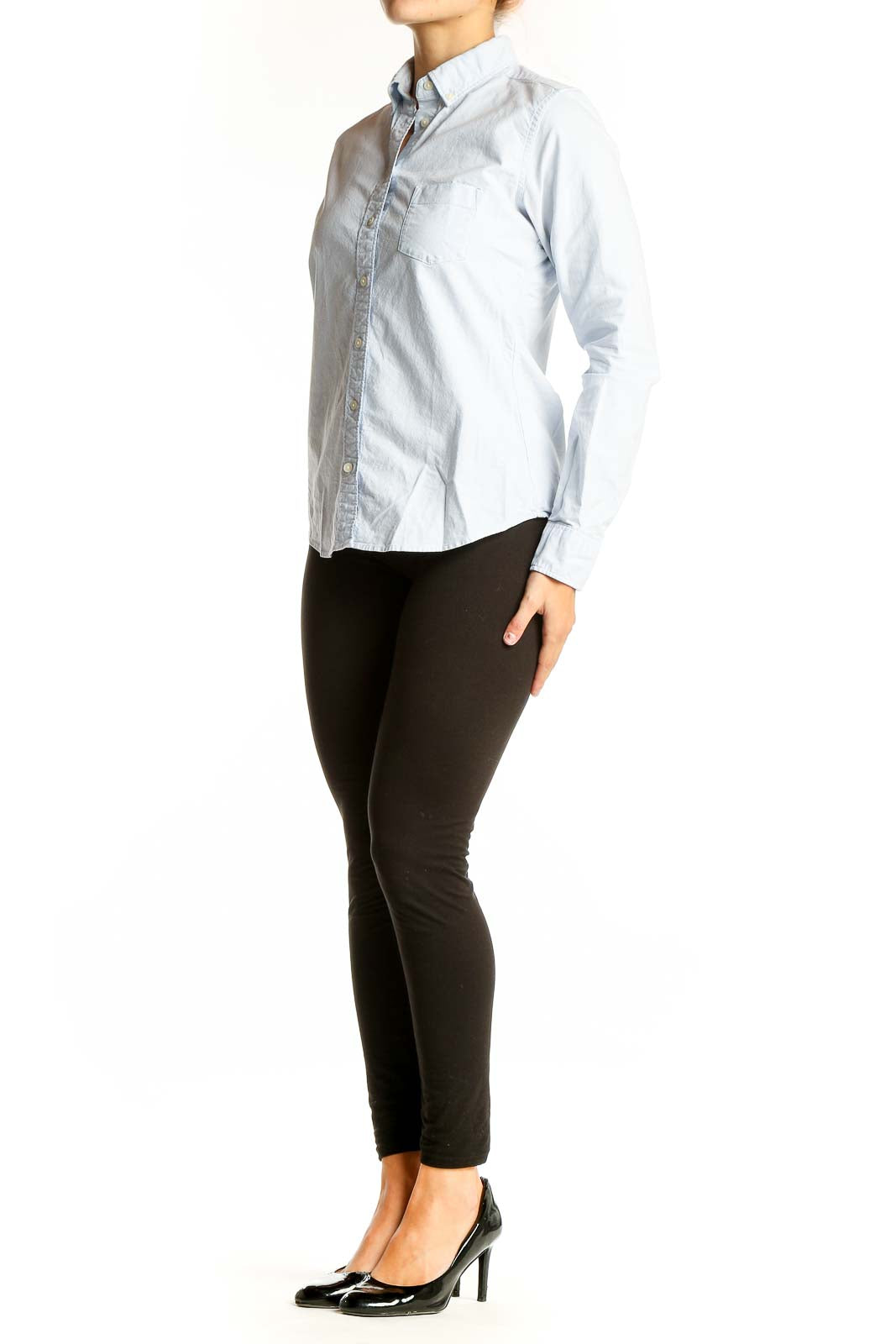 Front view of Uniqlo light blue button-down shirt with chest pocket