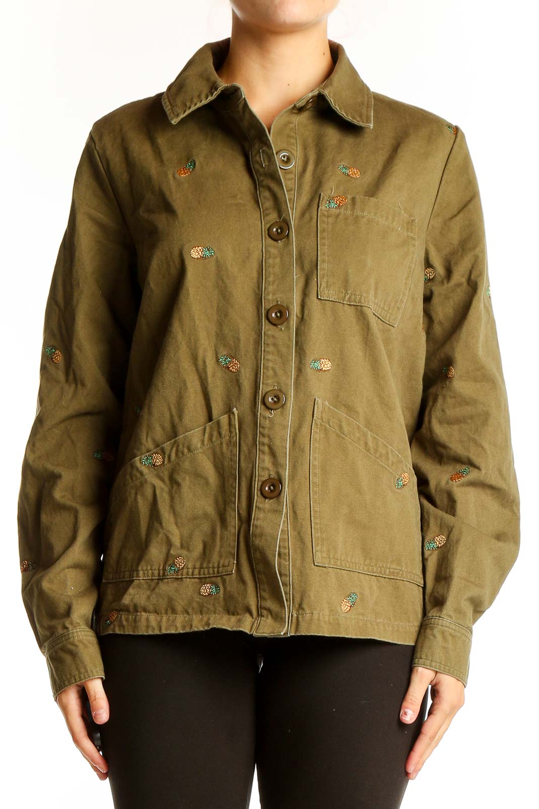 Front view of olive Seen Worn Kept utility jacket with embroidered details