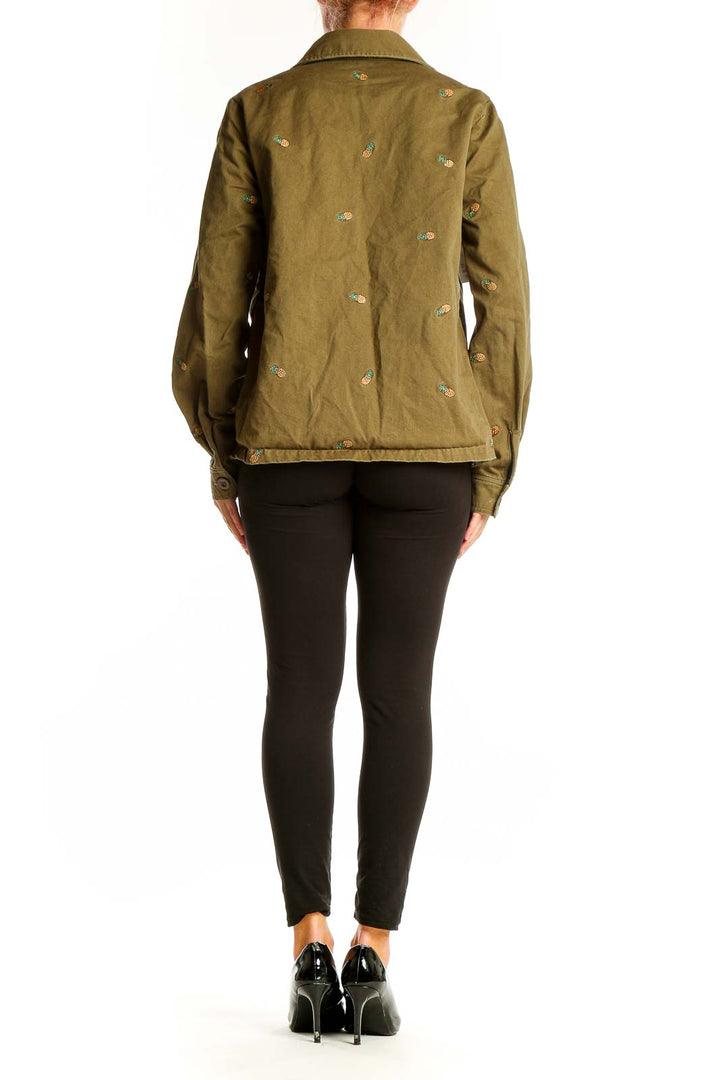 Back view of olive Seen Worn Kept utility jacket showing overall fit and style