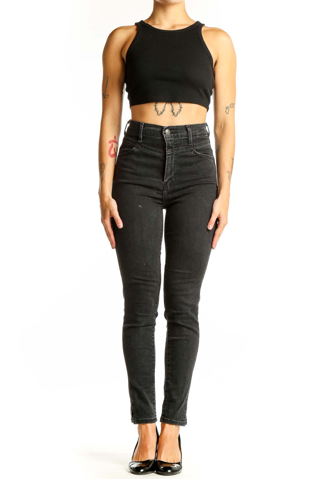 Front view of Levi's black high-waisted skinny jeans on model