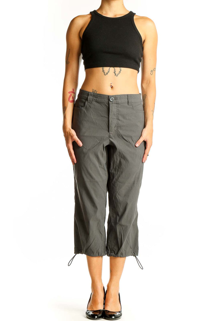 Front view of olive green Eddie Bauer capri cargo pants