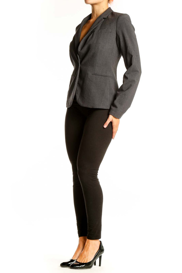 Front view of gray Calvin Klein single-button blazer