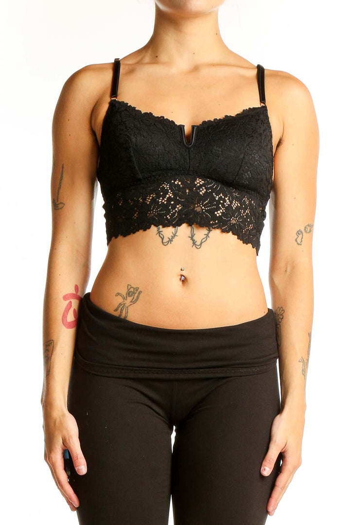 Front view of black lace crop top with sweetheart neckline