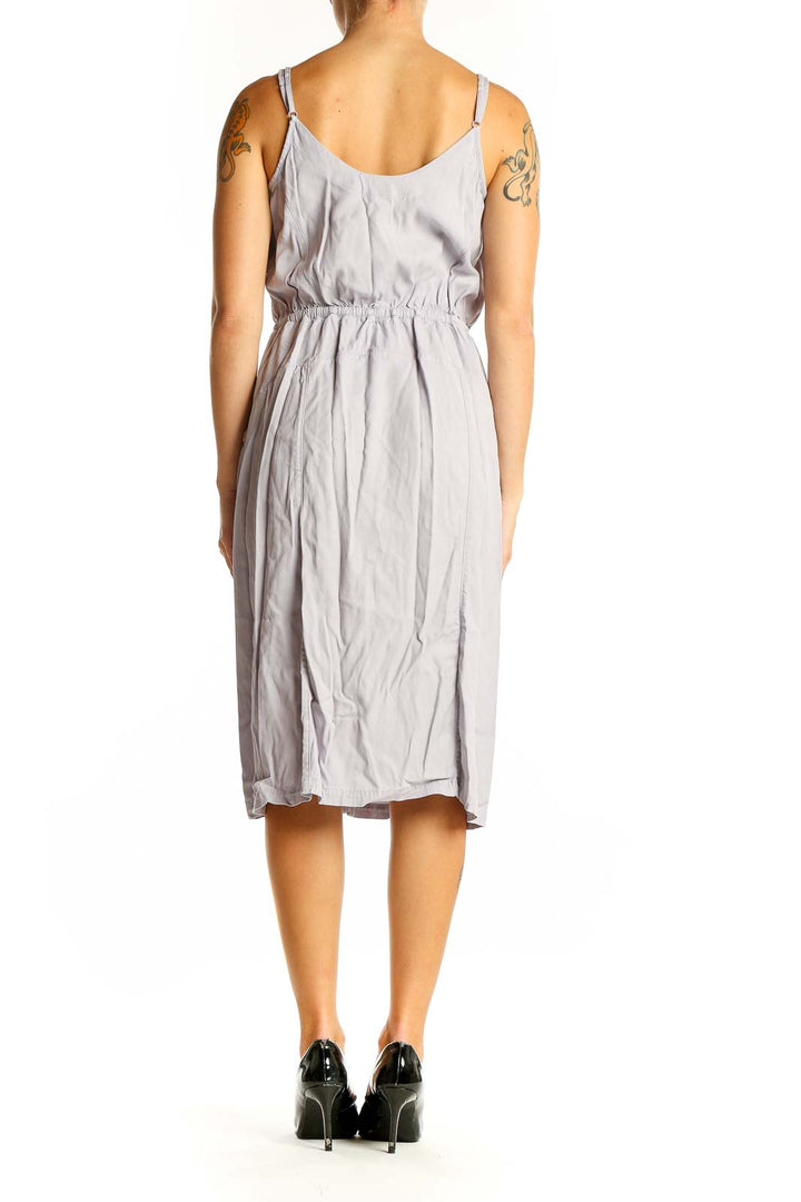 Side view of Lululemon light gray midi dress showing spaghetti straps and front slit