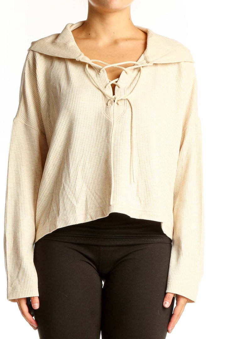 Front view of cream lace-up cropped sweater from vineyard vines