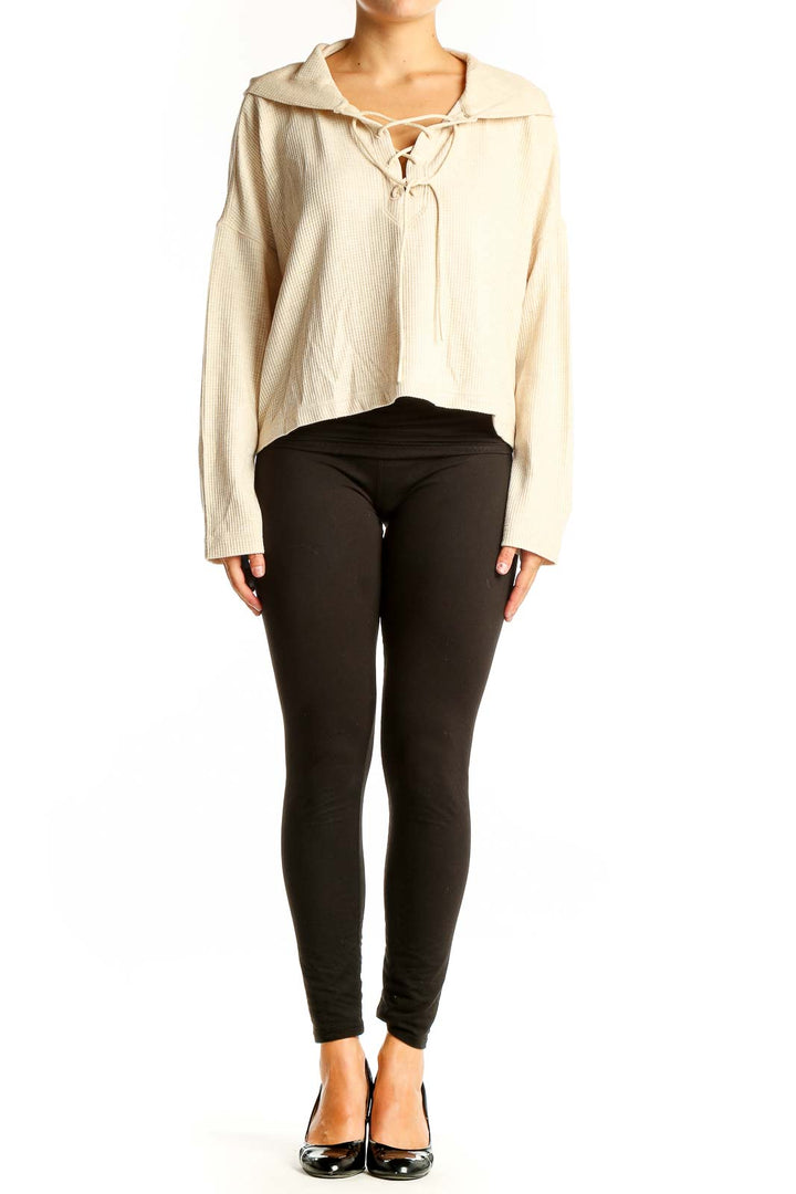 Front view of cream lace-up cropped sweater from vineyard vines