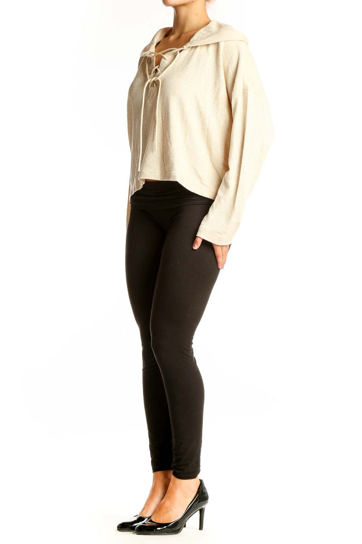 Front view of cream lace-up cropped sweater from vineyard vines