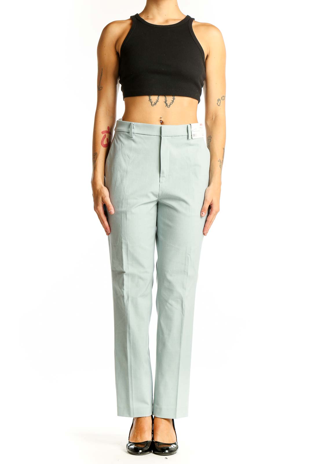 Front view of Uniqlo mint green straight-leg dress pants on model