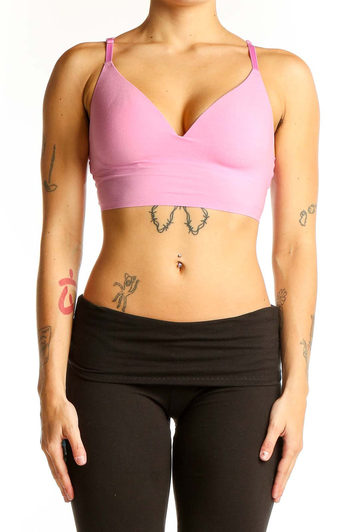 Front view of pink polyester crop top from Pink Victoria's Secret