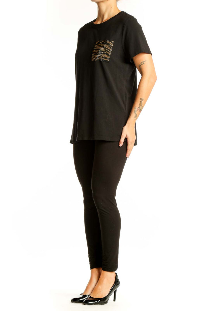 Front view of black Calvin Klein t-shirt with animal print pocket